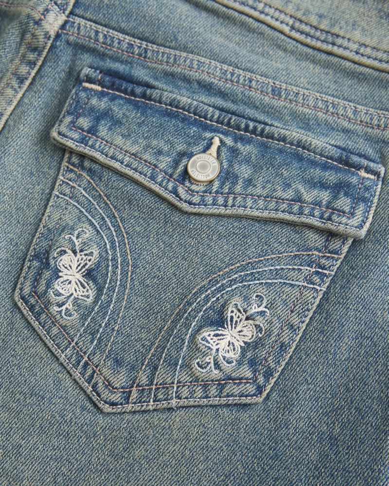 låg midja djupt tvättade broderade bootcut-jeans