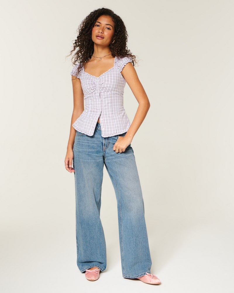 justerbar midjeband låg midja mellantvättade löst sittande jeans