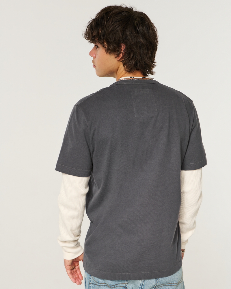 långärmad t-shirt med wolfs head-motiv och logotyp